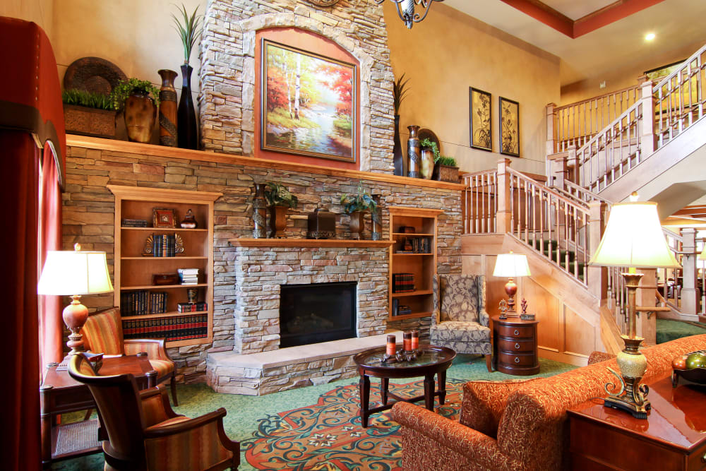 Lobby with a fireplace at Applewood Pointe of Roseville at Langton Lake in Roseville, Minnesota. 