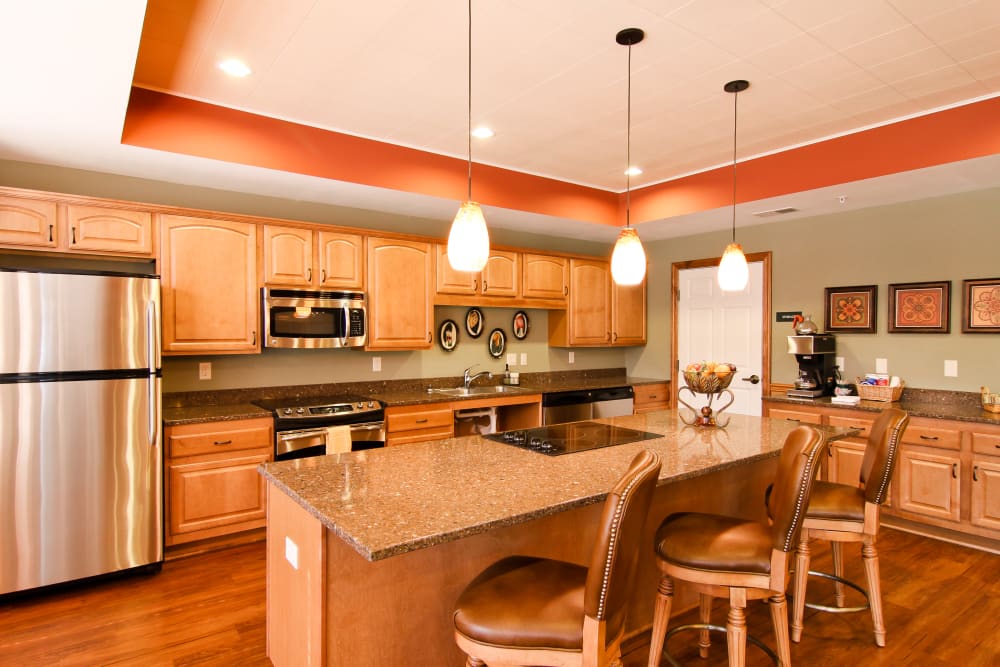 Great room kitchen at Applewood Pointe of Roseville at Langton Lake in Roseville, Minnesota. 
