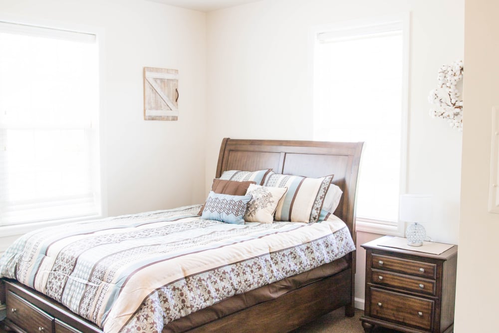 Resident apartments have inviting bedrooms at Arcadian Cove in Richmond, Kentucky.