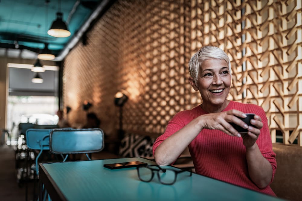 Resident enjoying the day out on the town near 21 West Street in New York, New York