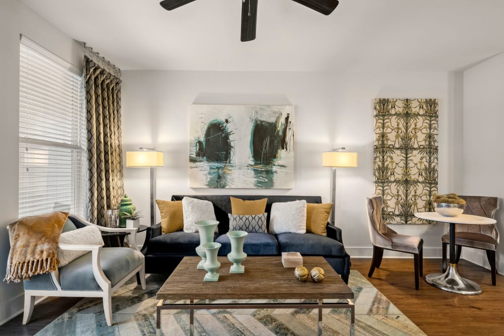 Well-furnished living space in a model home at Olympus Grand Crossing in Katy, Texas