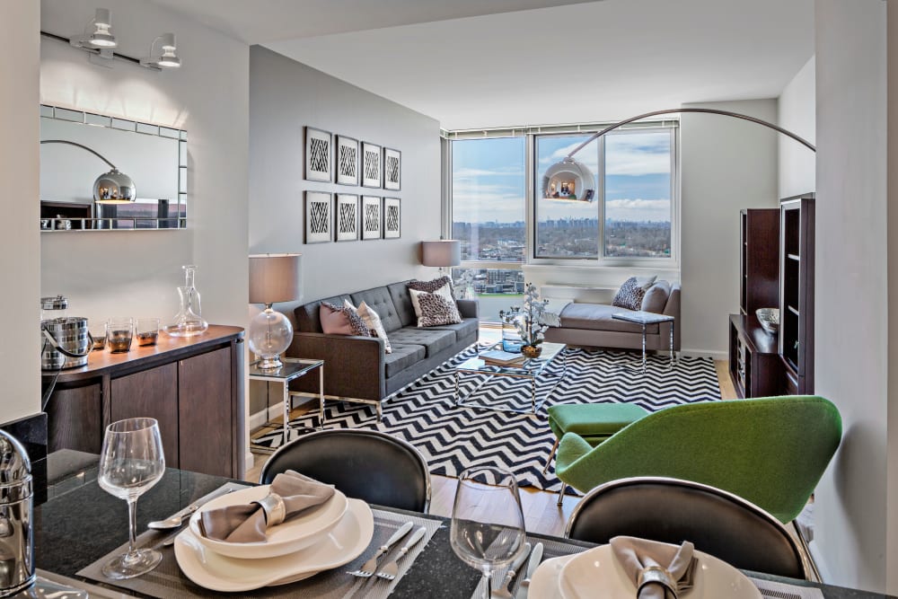 A model apartment dining room and living room at Skyline New Rochelle in New Rochelle, New York