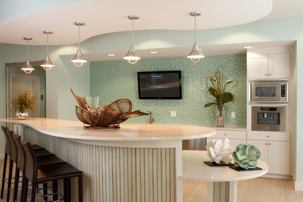 Resident clubhouse with a flatscreen TV at Abaco Key in Orlando, Florida