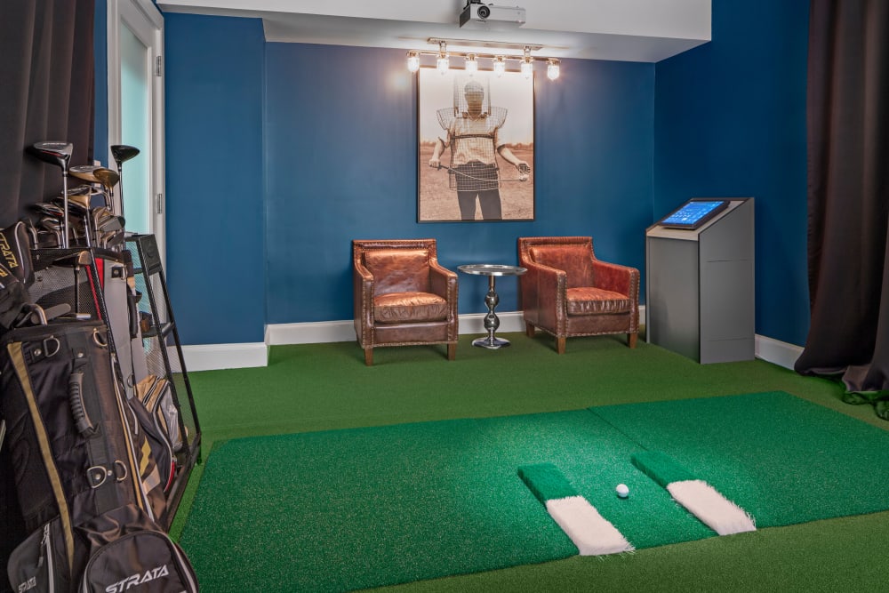 Indoor golf room at Bradlee Danvers in Danvers, Massachusetts