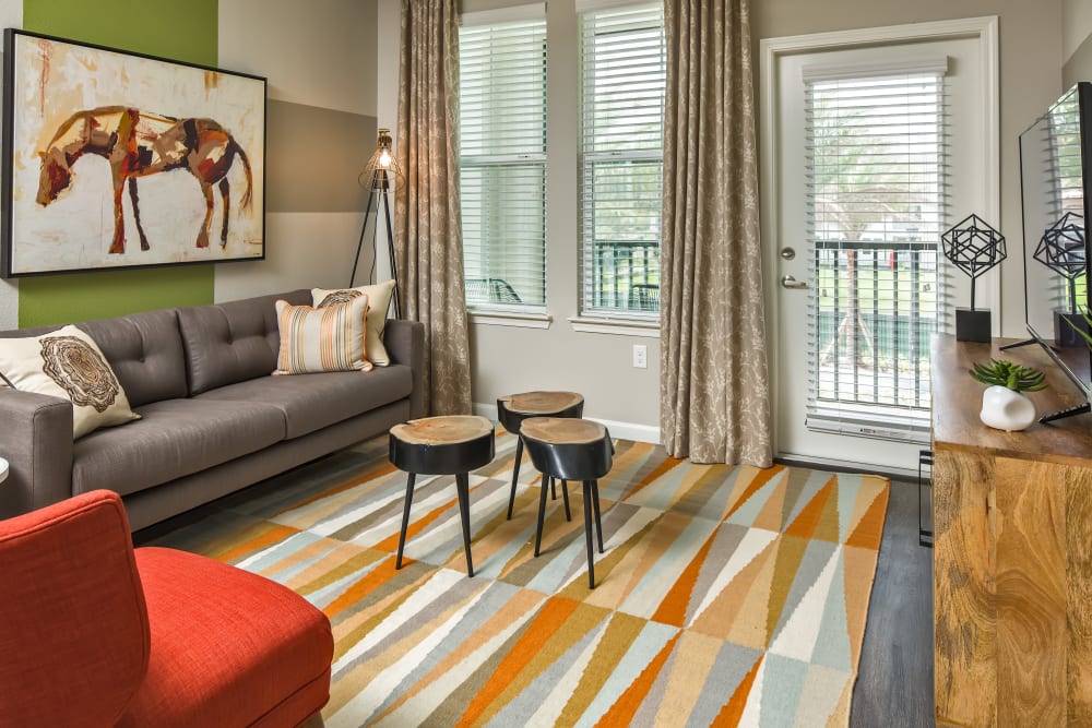 Bright, spacious living area at Linden Audubon Park in Orlando, Florida