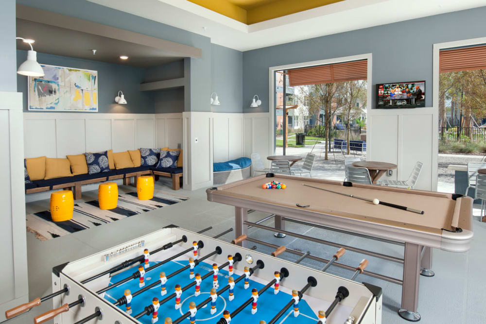 Billiards and foosball tables in Linden Crossroads's clubhouse in Orlando, Florida