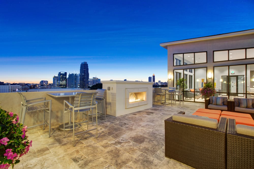 Rooftop lounge with a fireplace at Mark at West Midtown in Atlanta, Georgia