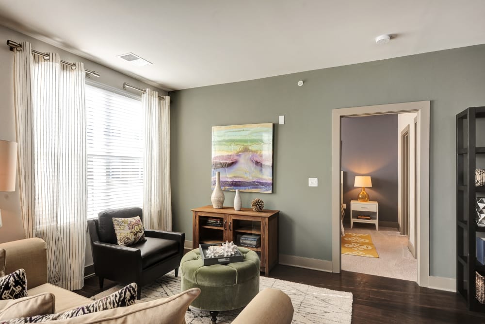 Well decorated living room at The Mark at Brickyard Apartment Homes in Beltsville, Maryland