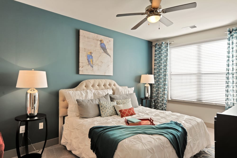 Inviting bedroom at The Mark at Brickyard Apartment Homes in Beltsville, Maryland.