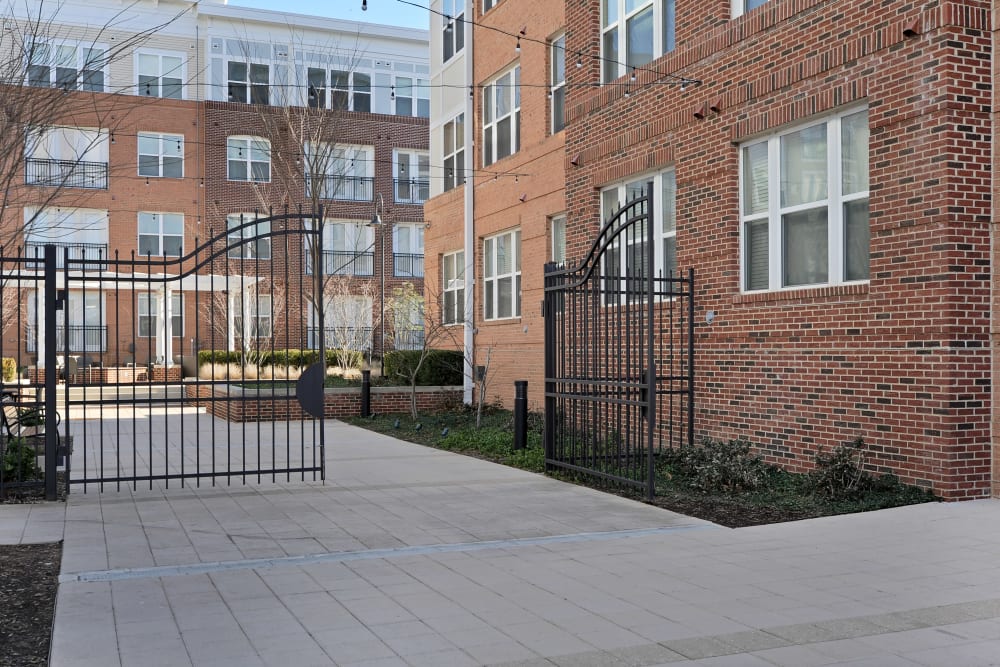 Gate to courtyard at The Mark at Brickyard Apartment Homes in Beltsville, Maryland.