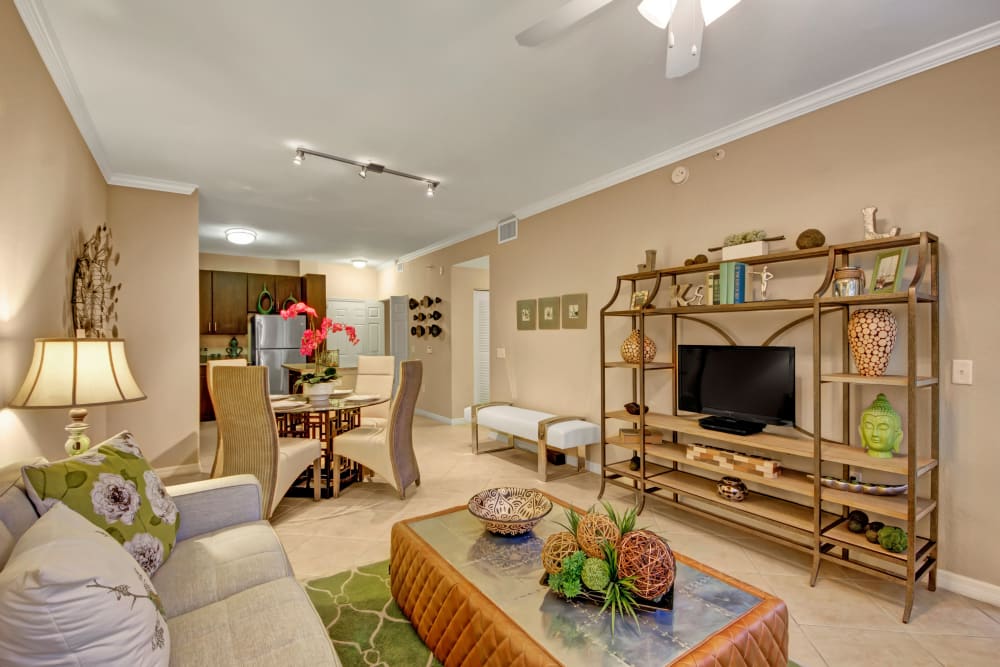 A model apartment living room and kitchen at City Center on 7th Apartment Homes in Pembroke Pines, Florida