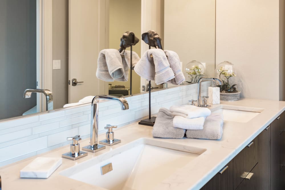 Quartz countertop in a model home's bathroom at El Potrero Apartments in Bakersfield, California