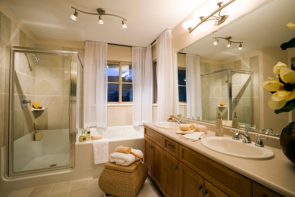 Spacious master bathroom in a model home at Highland View Court in Bakersfield, California