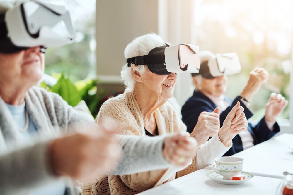 Residents enjoying virtual reality experience at Sunset Park Place in Dubuque, Iowa.