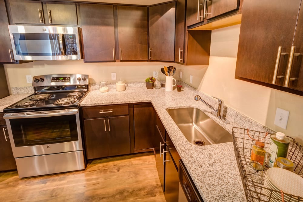 Gourmet kitchen with granite countertops in a model home at Granite 550 in Casper, Wyoming