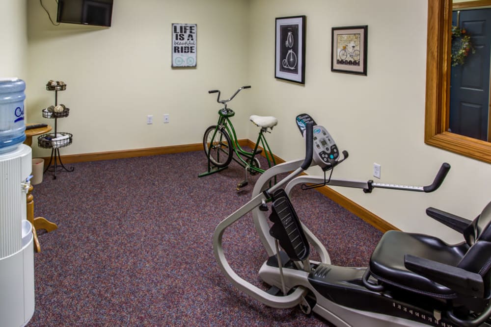 Resident gym with exercise equipment at Prairie Hills Clinton in Clinton, Iowa.