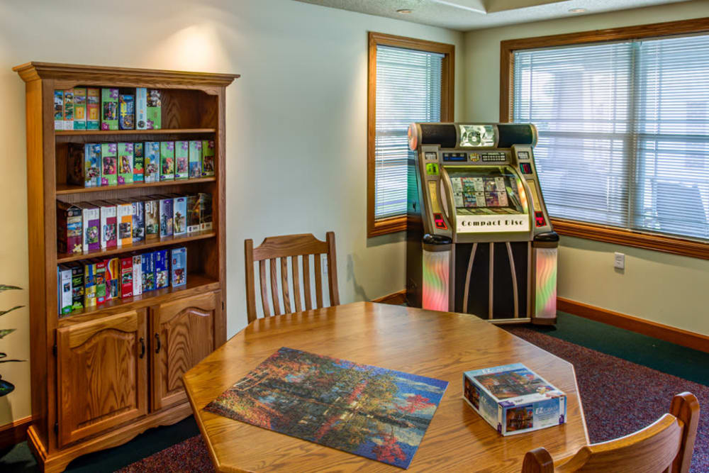 Activity room with puzzles at Addington Place of Clinton in Clinton, Iowa. 