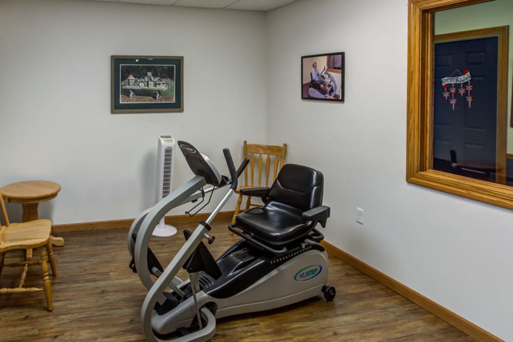 Resident exercise room with equipment at Prairie Hills Tipton in Tipton, Iowa.