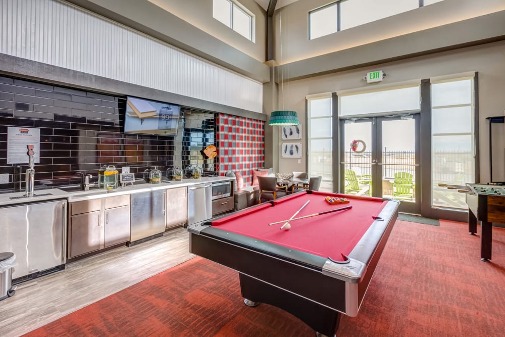Game room with billiards in the clubhouse at Granite 550 in Casper, Wyoming