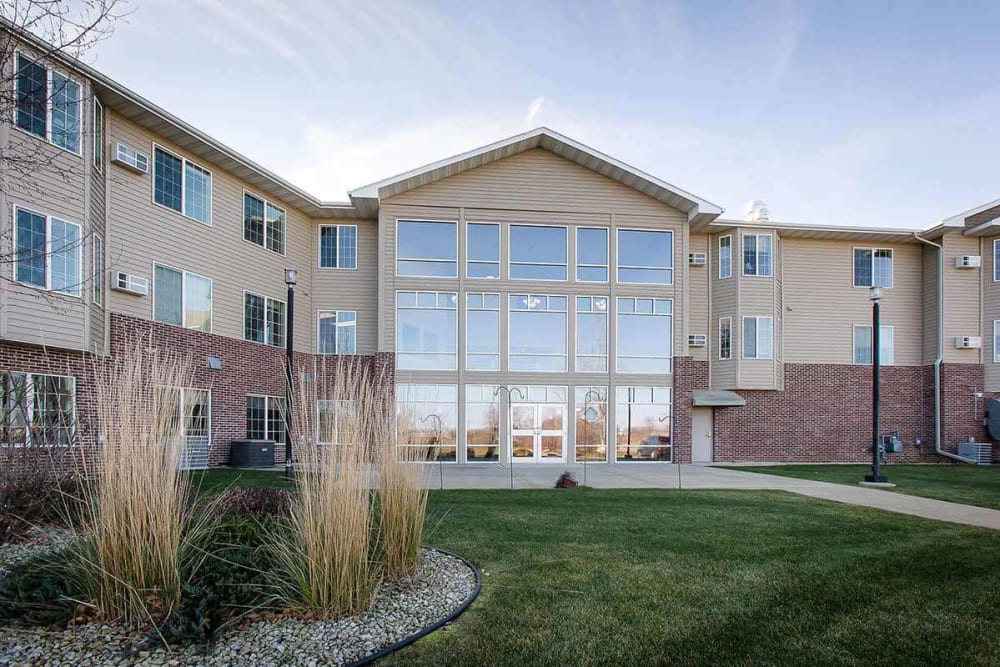 Courtyard and rear entrance at Prairie Meadows Senior Living in Kasson, Minnesota.