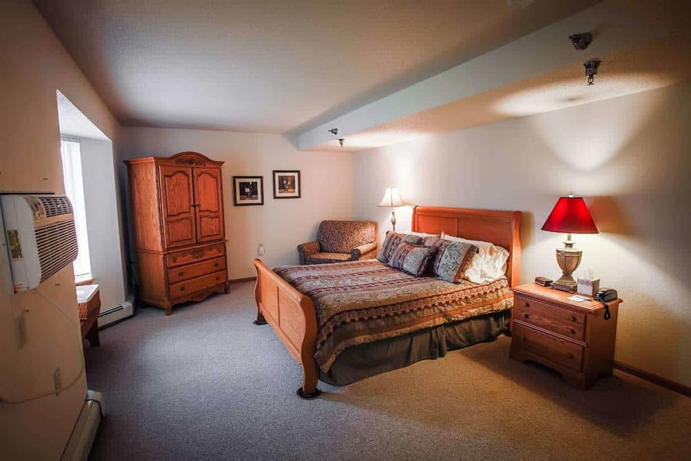 Spacious private resident bedroom at Prairie Meadows Senior Living in Kasson, Minnesota.