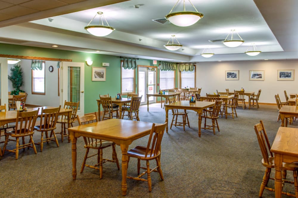 Spacious and brightly lit dining room at Addington Place of Carroll in Carroll, Iowa.