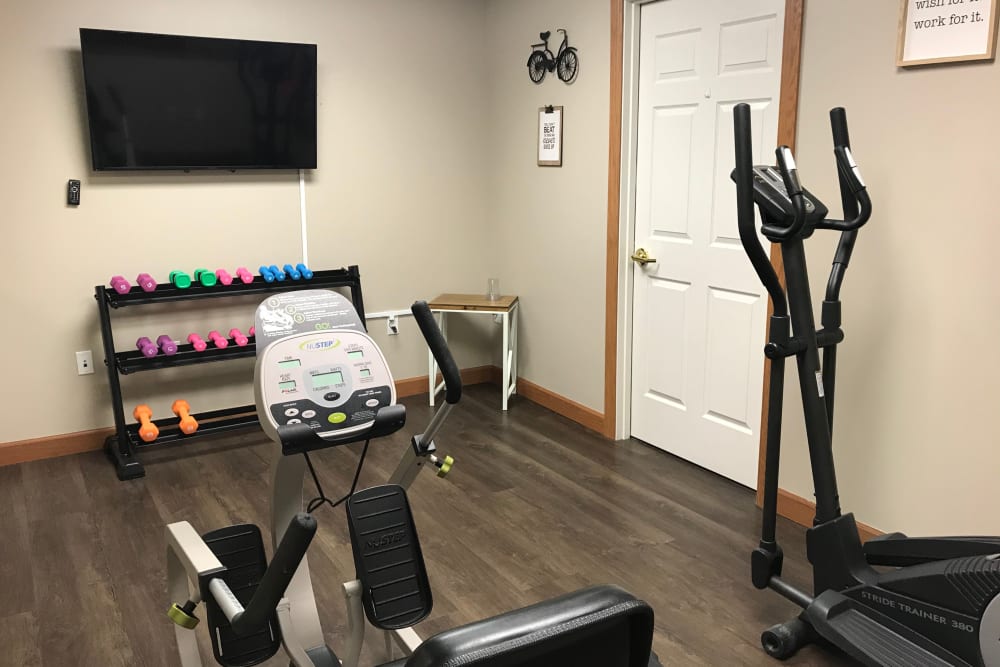 Exercise room with equipment at Addington Place of Des Moines in Des Moines, Iowa.