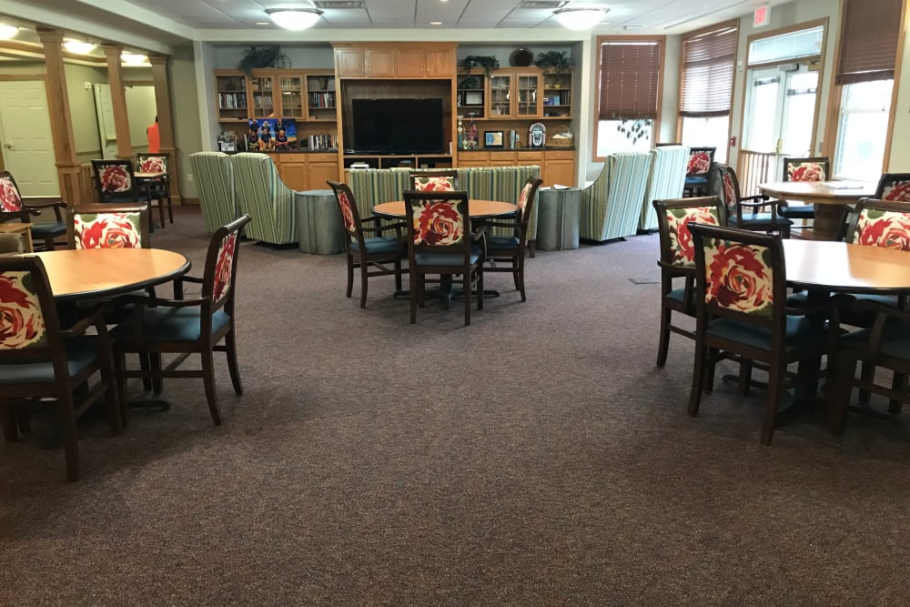 Large activity room with big screen TV at Addington Place of Des Moines in Des Moines, Iowa