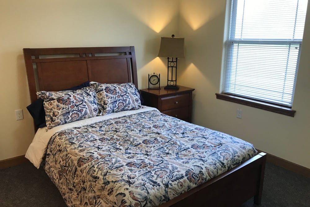 Spacious private resident bedroom at Prairie Hills Des Moines in Des Moines, Iowa. 