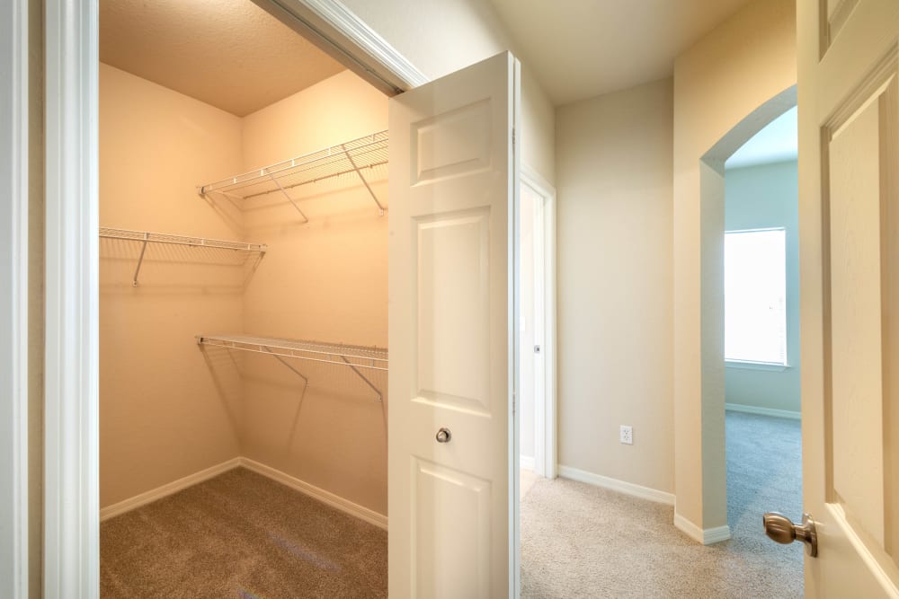 Spacious walk-in closet in a model home at Mirador & Stovall at River City in Jacksonville, Florida