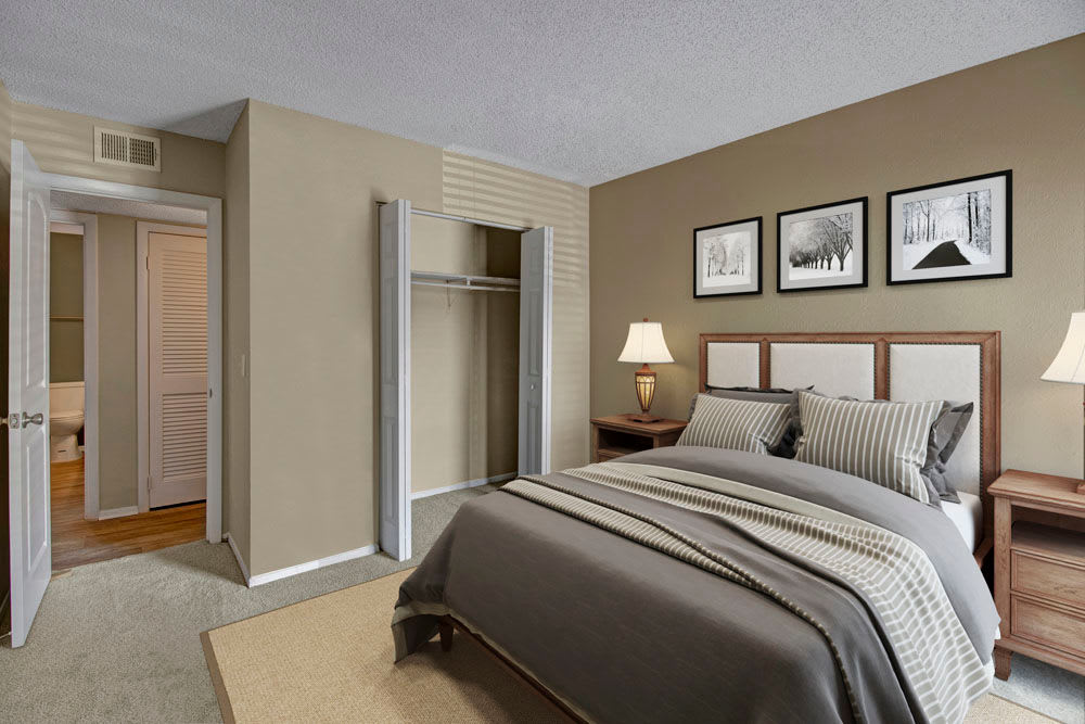 Bedroom decorated with photography on the walls at The Highland on Briley in Nashville, Tennessee