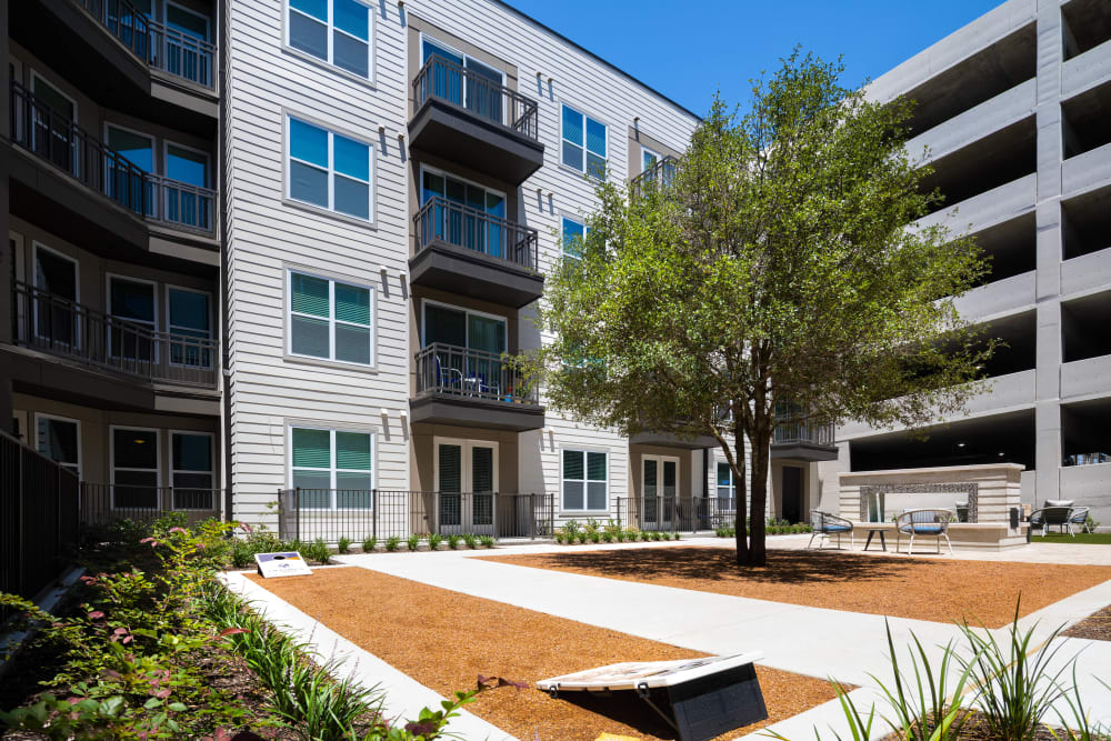 Cornhole courts at Lux on Main in Carrollton, Texas