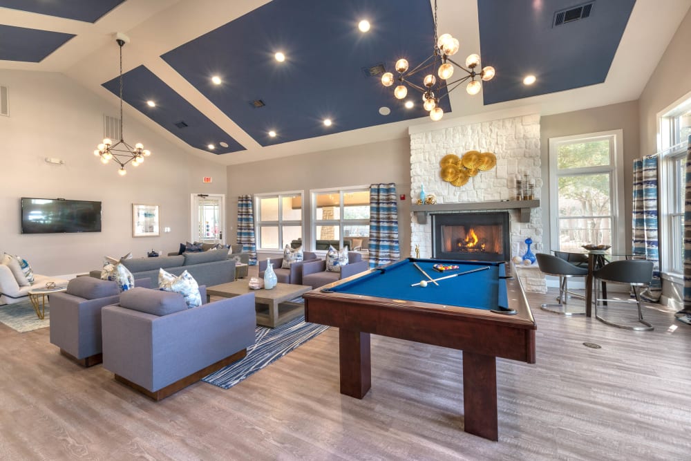 Billiards table in the clubhouse game room at Olympus Town Center in Keller, Texas