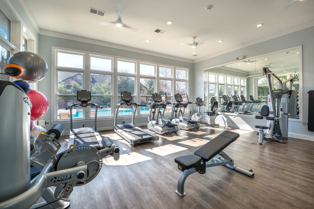 Well-equipped fitness center at Olympus Town Center in Keller, Texas