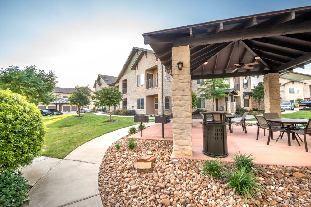 Covered barbecue area at Olympus Waterford in Keller, Texas