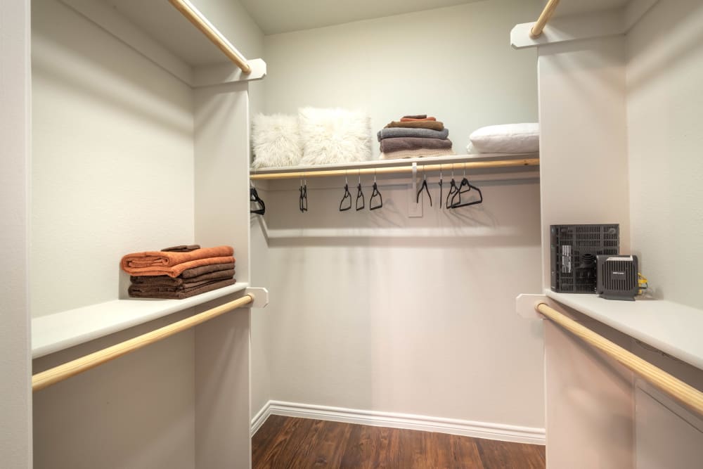 Spacious walk-in closet in a model home at Olympus Willow Park in Willow Park, Texas