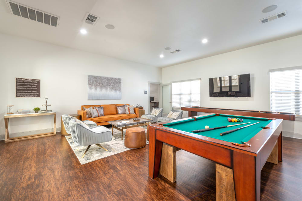 Game room in the clubhouse with billiards and more at Olympus Willow Park in Willow Park, Texas