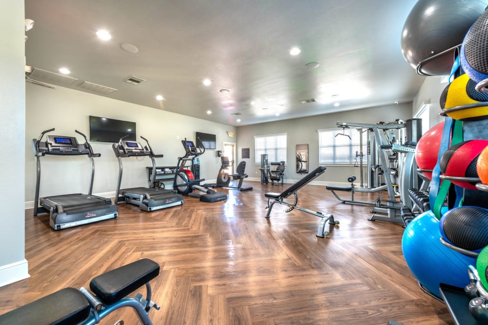 Well-equipped fitness center at Olympus Willow Park in Willow Park, Texas