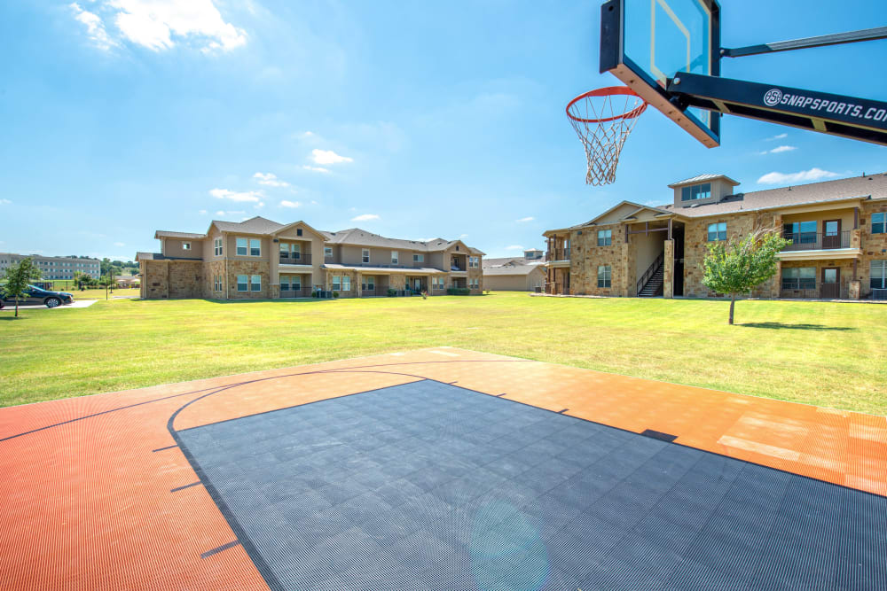 Onsite basketball court at Olympus Willow Park in Willow Park, Texas