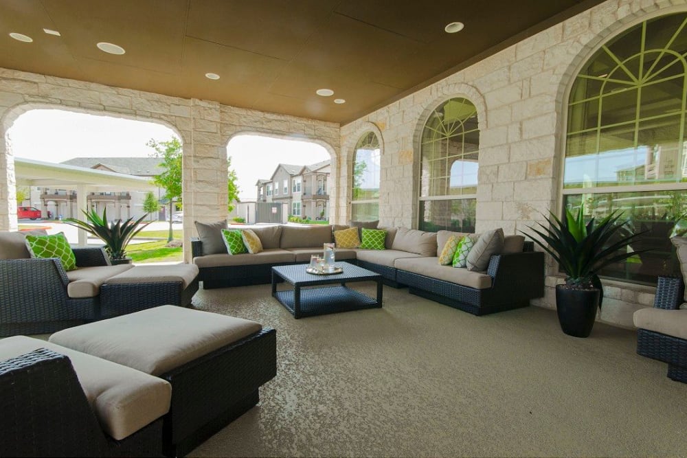 Large covered outdoor lounge at Olympus Woodbridge in Sachse, Texas