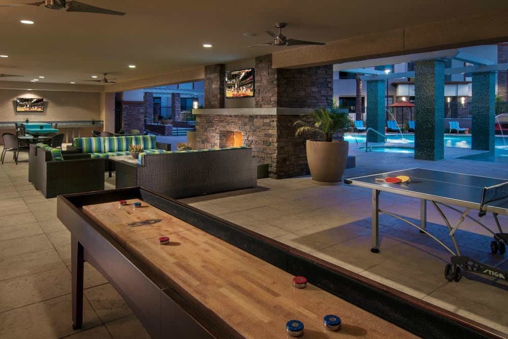 Tabletop shuffleboard and more in the game room at Redstone at SanTan Village in Gilbert, Arizona