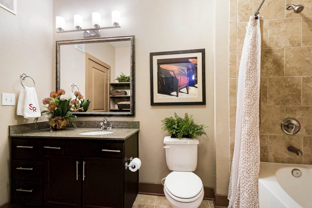 Custom tiled shower in a model home's bathroom at Sedona Ranch in Odessa, Texas