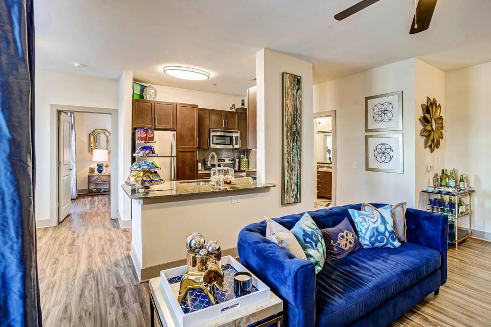 Well-furnished living area in a model home at Sundance Creek in Midland, Texas