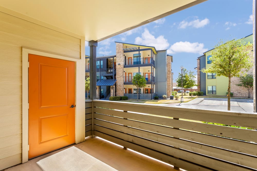 Private balcony with extra storage outside a model home at Tacara at Westover Hills in San Antonio, Texas