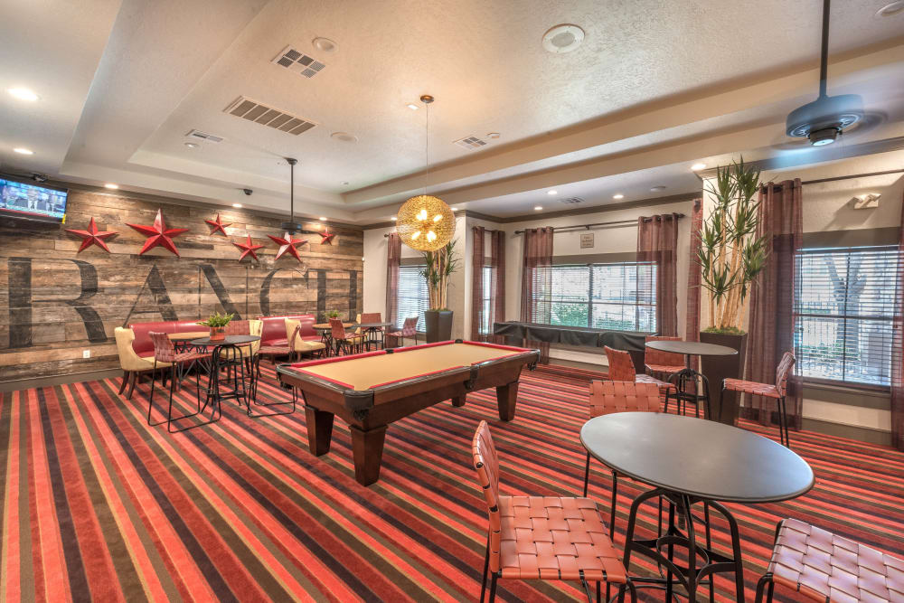 Game room with billiards in the clubhouse at The Ranch at Shadow Lake in Houston, Texas