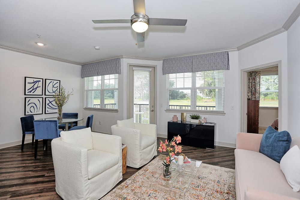 Ceiling fan and modern decor in the living area of a model apartment at The Slate in Savannah, Georgia