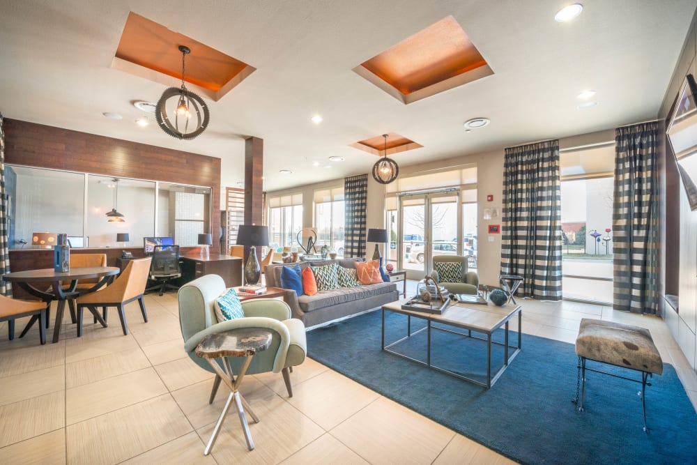 Plenty of places to relax in the clubhouse lounge at Union At Carrollton Square in Carrollton, Texas