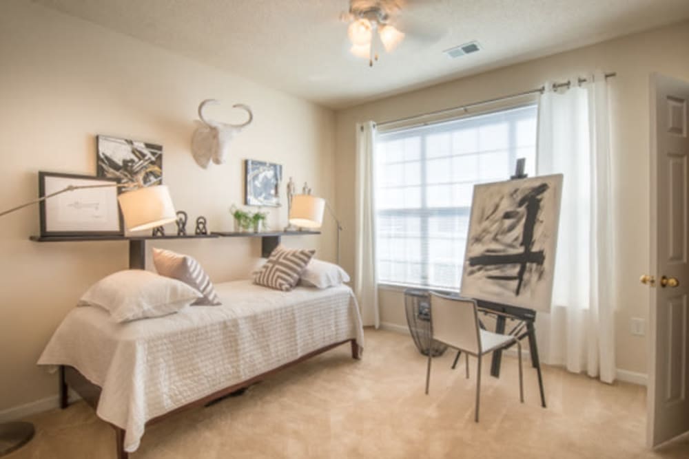 Guest room setup as an art studio in a model apartment at Walden at Chatham Center in Savannah, Georgia