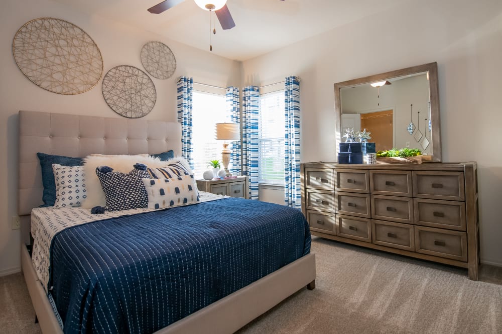Master bedroom at Bend at New Road Apartments in Waco, Texas