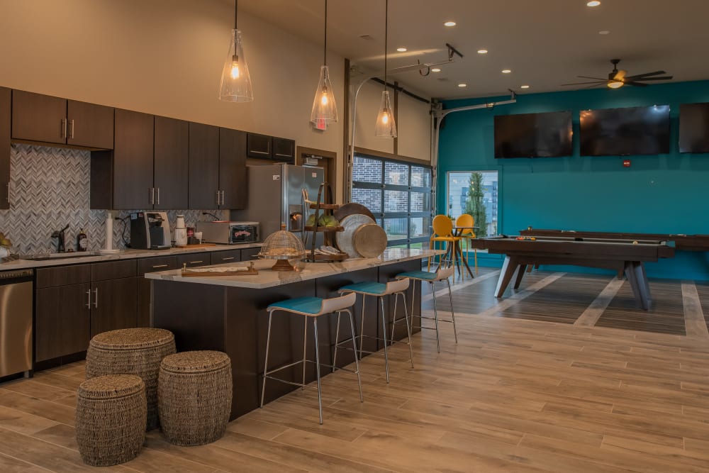 Community kitchen in Bend at New Road Apartments's clubhouse in Waco, Texas